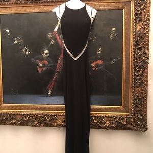 Long black evening gown, with jeweled outline